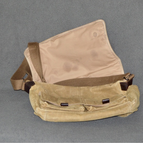 Briefcase from Andrew Marc constructed from a durable canvas with leather trim. - Picture 3 of 4